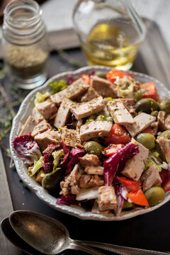 Mediterranean salad with tuna, olives and tomatoes