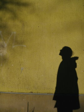 shadow man wall looking above
