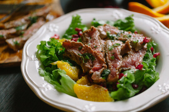 Grilled beef sliced with salad