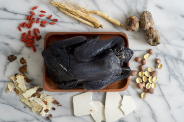 Chinese herbal black chicken soup