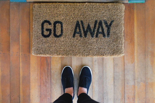 Doormat that reads ""Go Away""