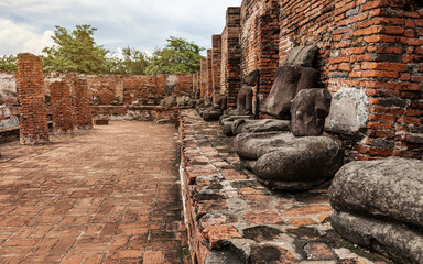 Ancient Statue of Buddha and Archaeological site at Ayutthaya Historical Park, Thailand. UNESCO world heritage