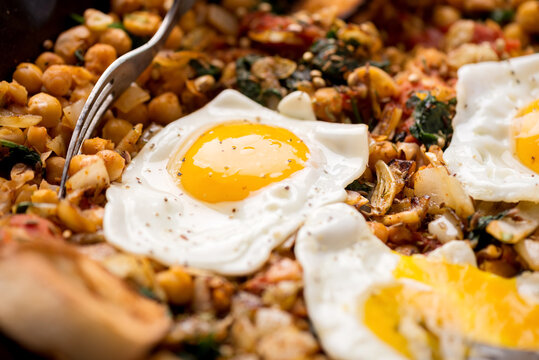 Spinach With Chickpeas And Fried Eggs