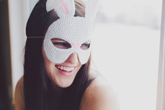 Woman wearing bunny mask