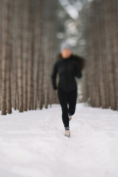 Female jogging in snow