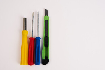 construction tools screwdrivers on a light background equipment for repair industry