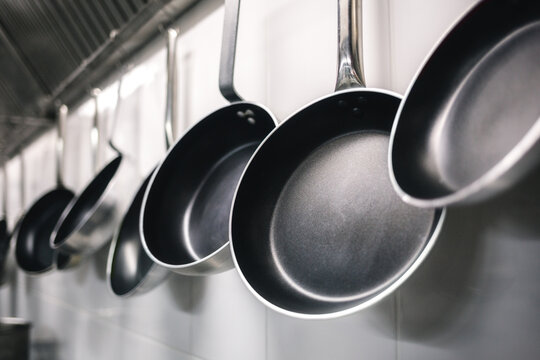 Frying Pans Hanging in a Kitchen