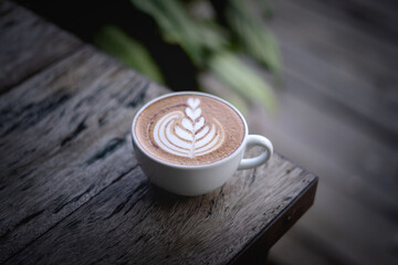 coffee on the wooden table from above. Urban coffee shop  workspace or coffee break in morning