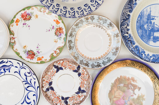Old plates on white background