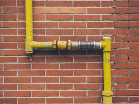 water pipe on the brick wall