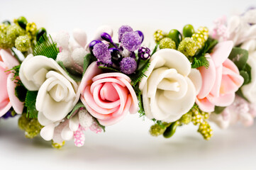 Hair hoop decorated with delicate color artificial flowers.