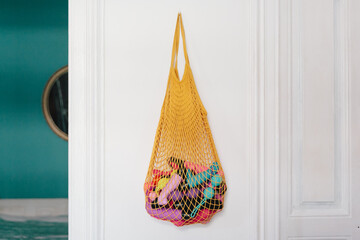 Net with sex toys attached to a wall