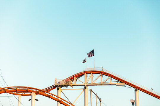 Summit of roller coaster and view of the tracks with copy space
