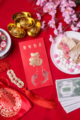 Chinese new year festival decorations, ang pow,chinese sweetmeat ,red packet and gold ingots.