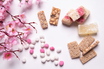 Candy comfit, Chinese sweetmeat made of many ingredientson on white background.