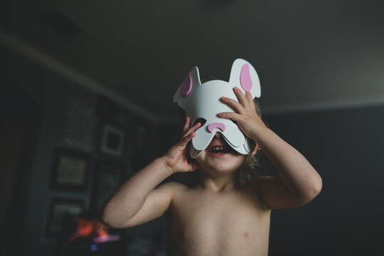 Putting on a bunny mask