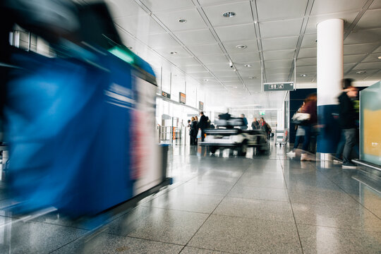Passenger Queueing Up at Gate in Modern Airport