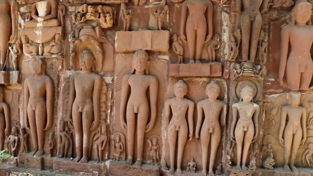 Panning, antique bas-reliefs in the Jain Temple, Deogarh, India