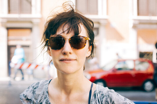 Portrait of Caucasian Woman Wearing Sunglasses
