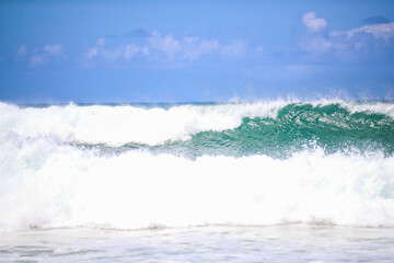 Surfing at Hanalei Beach, Kauai, Hawaii