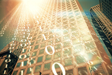 Data theme hologram drawing on city view with skyscrapers background multi exposure. Bigdata concept.