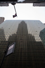 Chrysler Building reflection in windows of another building in New York, USA