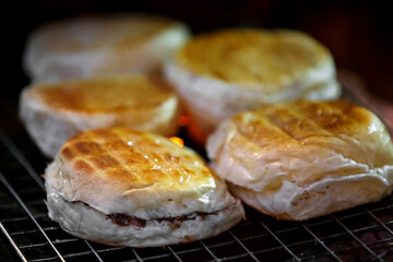 close up homemade Grilled toast bun with butter on stove