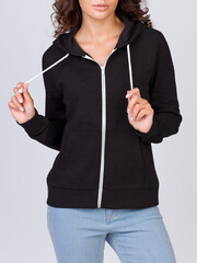 Beautiful woman in the template of a women's sweatshirt of black color