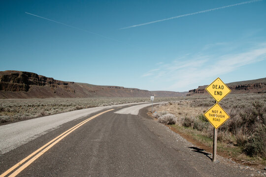 Dead end road in the desert on a clear morning