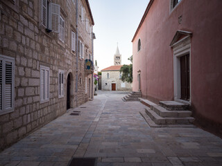 Fototapeta na wymiar Street of the old town of Rab in Croatia