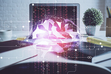 Double exposure of work space with computer and human brain drawing hologram. Brainstorm concept.