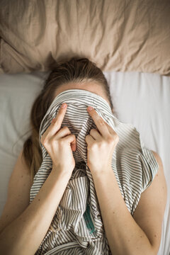 Angry woman on the bed