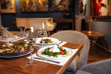 Restaurant table served with spanish dishes