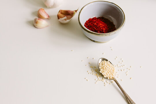 Sesame seeds, garlic and gochugaru (Korean chilli flakes)