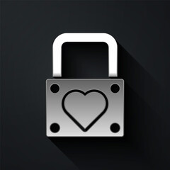 Silver Lock and heart icon isolated on black background. Locked Heart. Love symbol and keyhole sign. Valentines day symbol. Long shadow style. Vector.