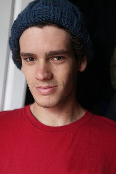 Hipster College Kid Wearing Rec Shirt and Blue Beanie