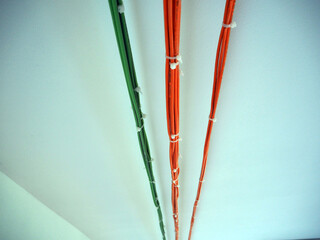 Fiber optic cable along the wall