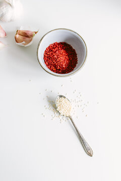 Sesame seeds, garlic and gochugaru (Korean chilli flakes)