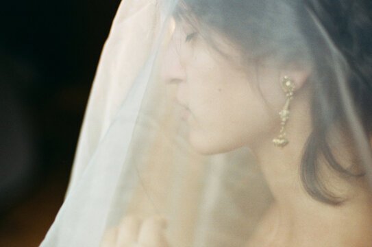 Portrait of a woman under a veil