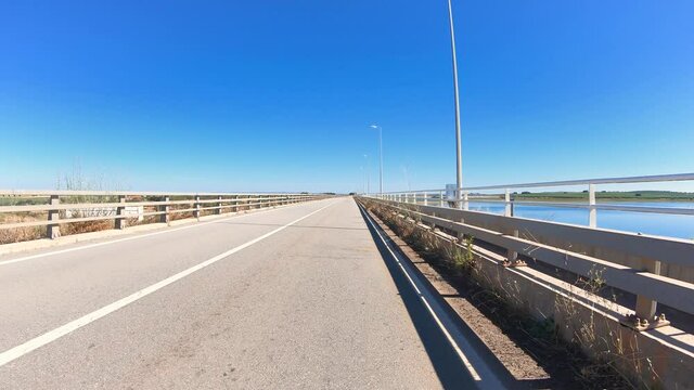 dolly move forward - EN386 paved road at the Brinches water reservoir, municipality of Serpa, district of Beja, Alentejo, Portugal