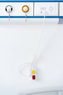 Hospital bed remote alarm