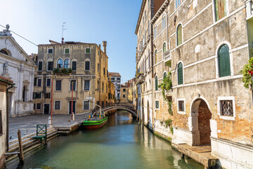 Fototapeta na wymiar Rio del Mondo Novo in Venice, Veneto, Italy seen from a bridge