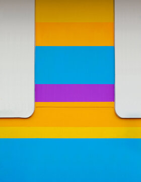 Blue Purple Yellow Orange at horizontal strip of wall background