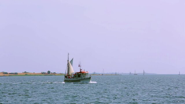 Danish sailing ship sailing towards the port of Faaborg for the traditional sailing show