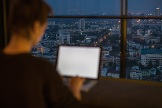 Woman working from her laptop at home