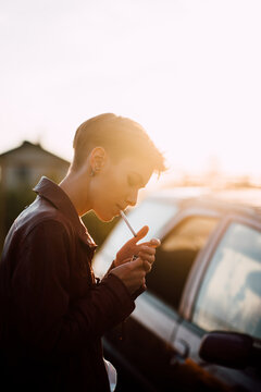 Young attractive woman smoking a cigarette