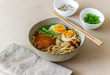 Ramen soup with noodles, pork, mushrooms and eggs. Japanese cuisine. Recipe.