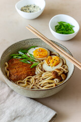 Ramen soup with noodles, pork, mushrooms and eggs. Japanese cuisine. Recipe.