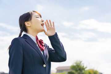 空を見上げて叫ぶ女子高生