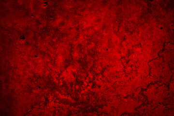 Black red grunge stone background. Toned concrete cement texture background. Rough dirty concrete wall surface. Macro. Dark red bright banner.